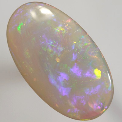 SOLID SEMI BLACK OPAL  Huge opal. Very bright fire, Large rolling flashes. SEE VIDEO